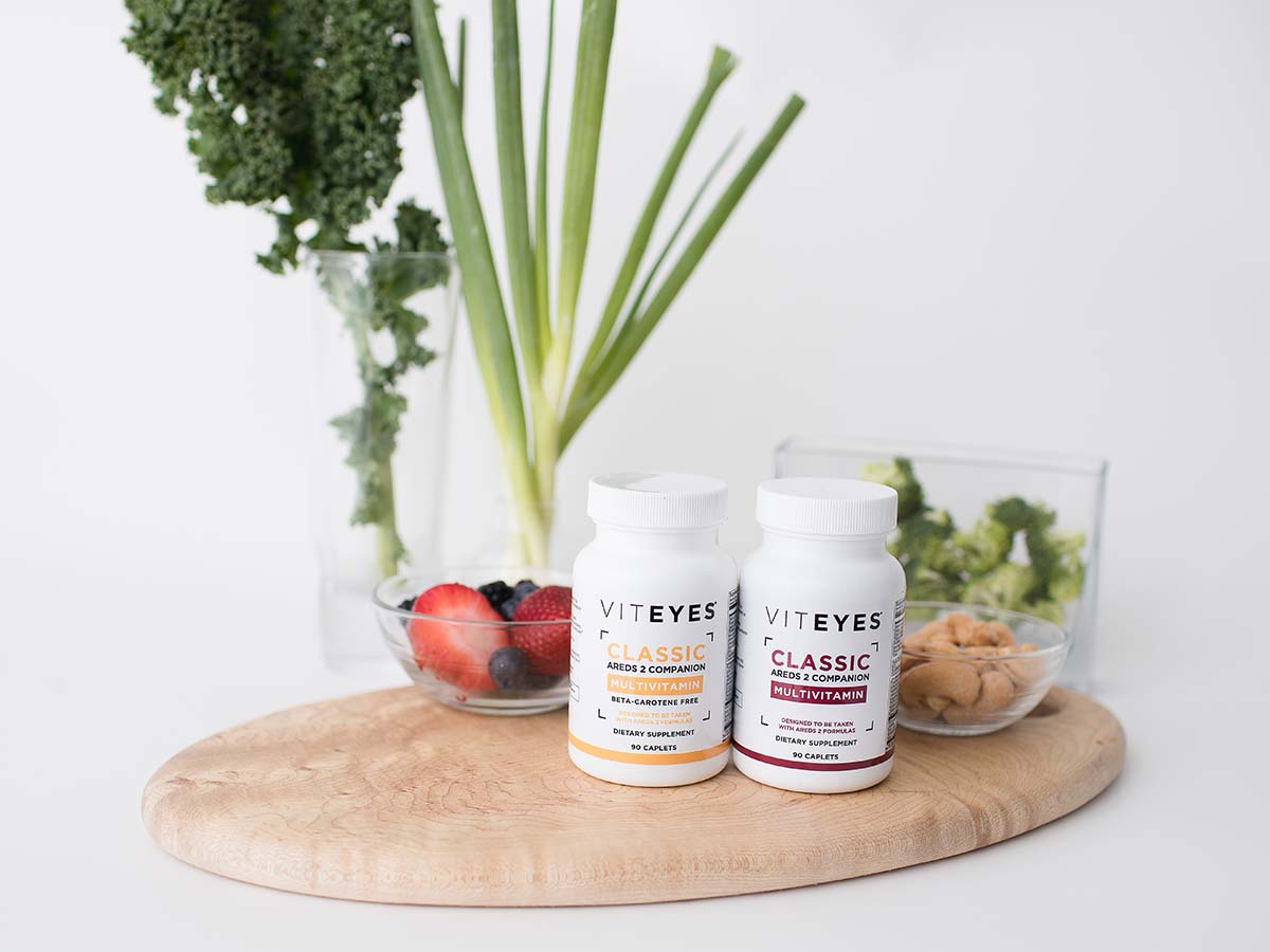 eye supplements on counter with fruit